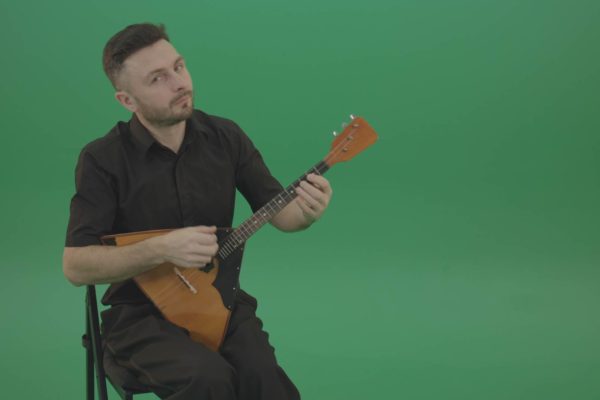 Musician on green screen music player video footage